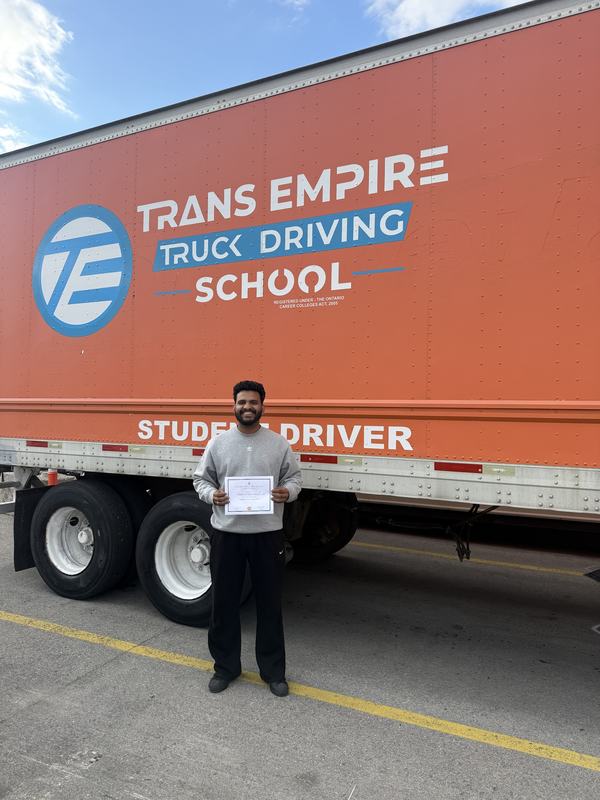 Trans Empire Truck Driving School graduate with their certificate