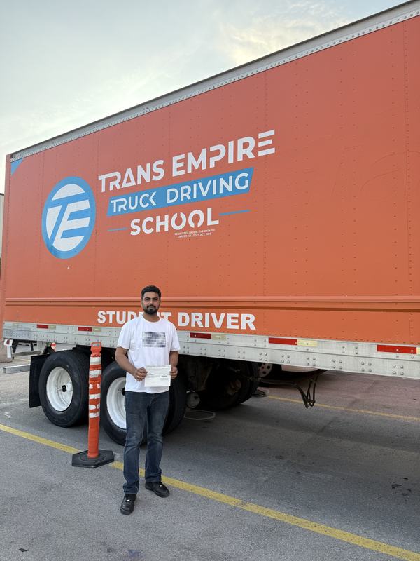 Trans Empire Truck Driving School graduate with their certificate